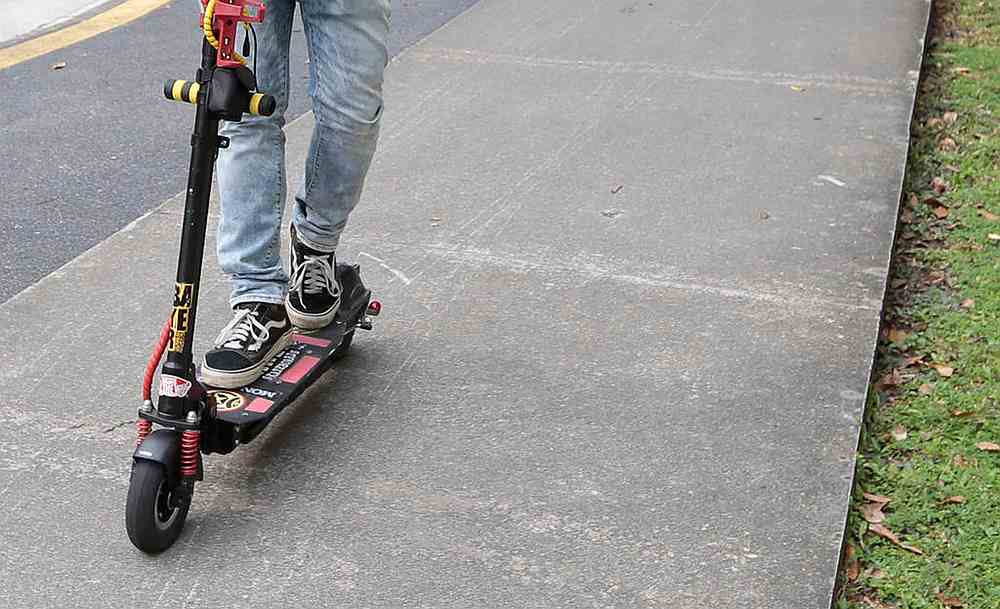 Riding his e-scooter at a speed of about 40kph to 50kph, a Singapore teenager collided into a young boy and the crash then caused the pillion rider to fall off and be dragged a distance. u00e2u20acu201d TODAY pic