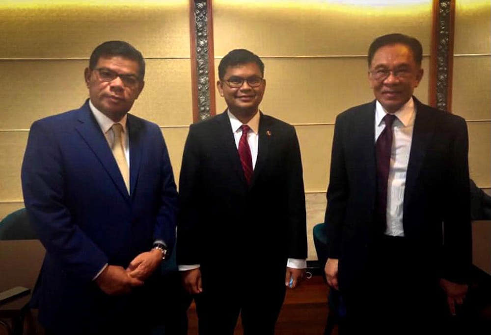 (From left) Datuk Seri Saifuddin Nasution Ismail, Akmal Nasrullah Mohd Nasir and Datuk Seri Anwar Ibrahim pose for a picture at Parliament in Kuala Lumpur December 14, 2020. u00e2u20acu201d Picture via Facebook/ Akmal Nasir 