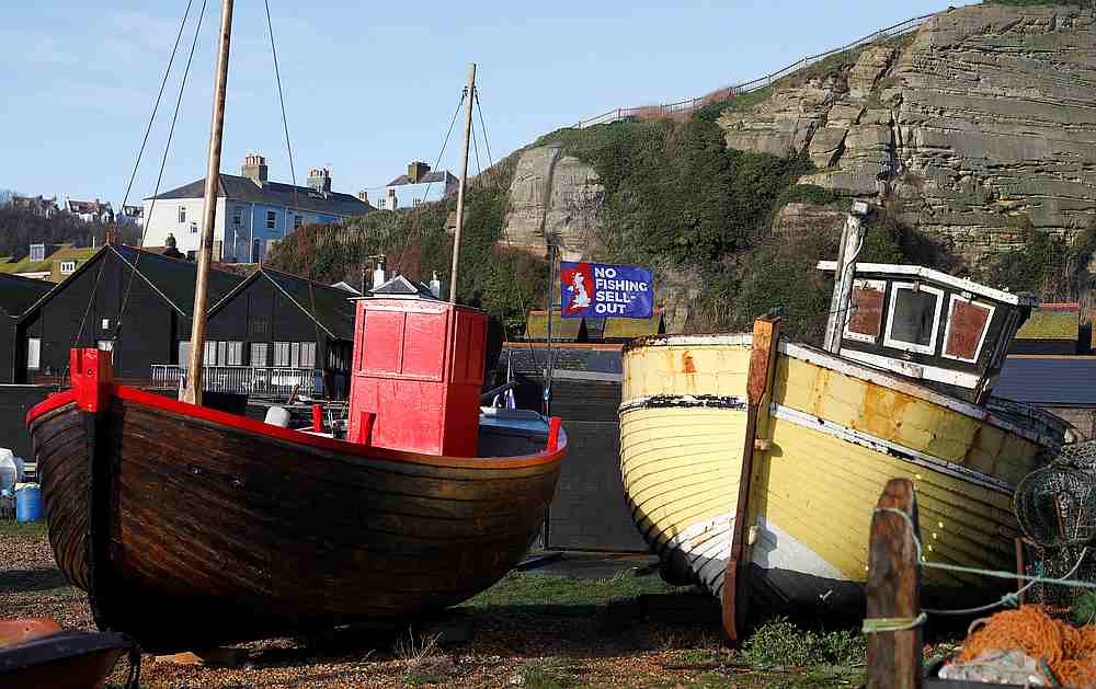 A flag with a slogan supporting the UK fishing industry is seen on the beach in Hastings, Britain December 20, 2020. u00e2u20acu201d Reuters pic