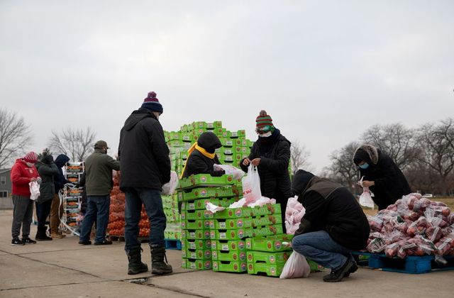 Volunteers from Forgotten Harvest food bank sort and separate different goods before a mobile pantry distribution ahead of Christmas, amid the Covid-19 pandemic in Warren, Michigan, US, December 21, 2020. u00e2u20acu201d Reuters pic