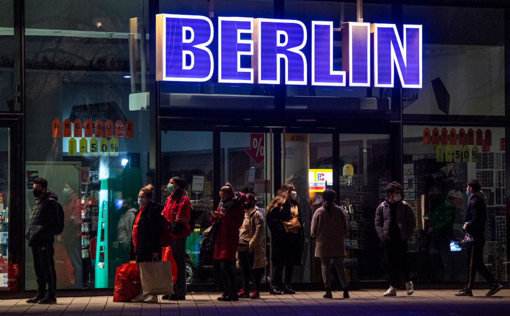 People queue outside a discount apparel store at Berlinu00e2u20acu2122s Alexanderplatz shopping district December 15, 2020, ahead of a partial lockdown to curb the spread of the ongoing novel coronavirus pandemic. u00e2u20acu201d AFP pic 