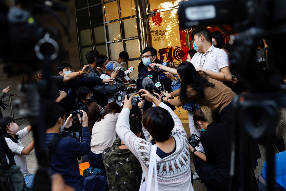 i-Cable TV news journalist talks to the media after being laid off in Hong Kong December 1, 2020. u00e2u20acu201d Reuters pic 