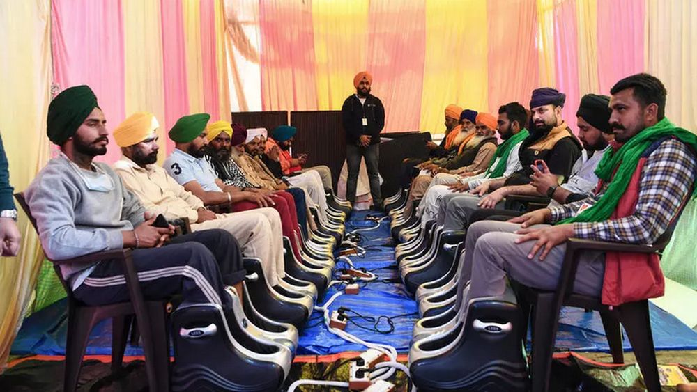 In one tent, volunteers have set up two neat rows of about 20 foot-massage machines. u00e2u20acu201d AFP pic