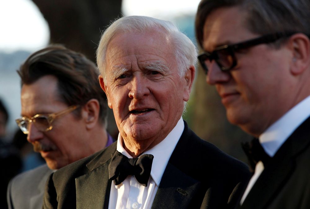 British author John Le Carre (centre) poses for photographers with British actor Gary Oldman (left) and Swedish director Tomas Alfredson at the UK premiere of u00e2u20acu02dcTinker Tailor Soldier Spyu00e2u20acu2122 in London September 13, 2011. u00e2u20acu201d Reuters pic