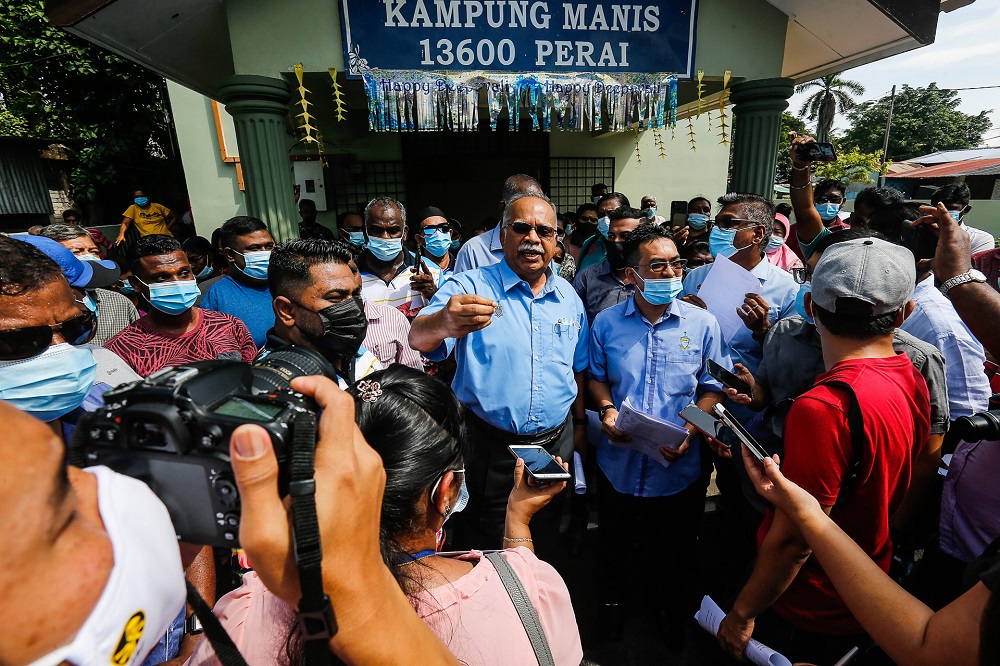 Deputy Chief Minister P. Ramasamy speaks to reporters during a visit to Kampung Manis on December 16, 2020. u00e2u20acu2022 Picture by Sayuti Zainudin