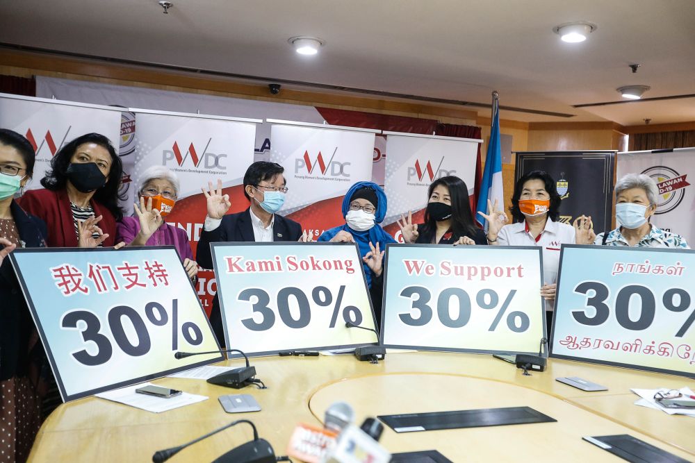 Penang Chief Minister Chow Kon Yeow (centre) unveils an initiative to nominate women for the state legislative assembly dubbed TWOAS at Komtar in George Town December 10, 2020. u00e2u20acu201d Picture by Sayuti Zainudinnn