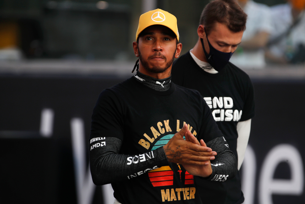 Mercedes driver Lewis Hamilton takes part in the End Racism event ahead of the Abu Dhabi Formula One Grand Prix at the Yas Marina Circuit in the Emirati city of Abu Dhabi December 13, 2020. u00e2u20acu201d AFP picnn