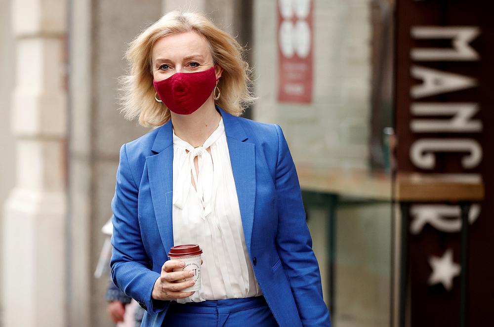 Britain's International Trade Secretary Liz Truss walks out of a coffee shop in Westminster, London, Britain November 10, 2020. u00e2u20acu201d Reuters pic