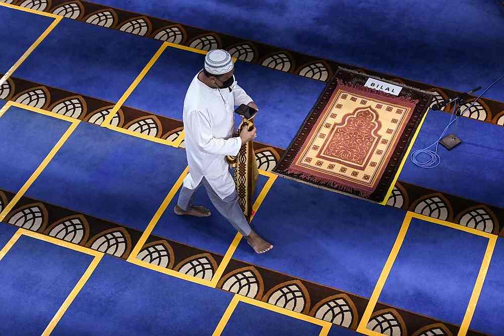 Religious organisations in Singapore will be able to increase their capacity for worship services to up to 250 people, separated in zones of up to 50 people. u00e2u20acu201d AFP pic