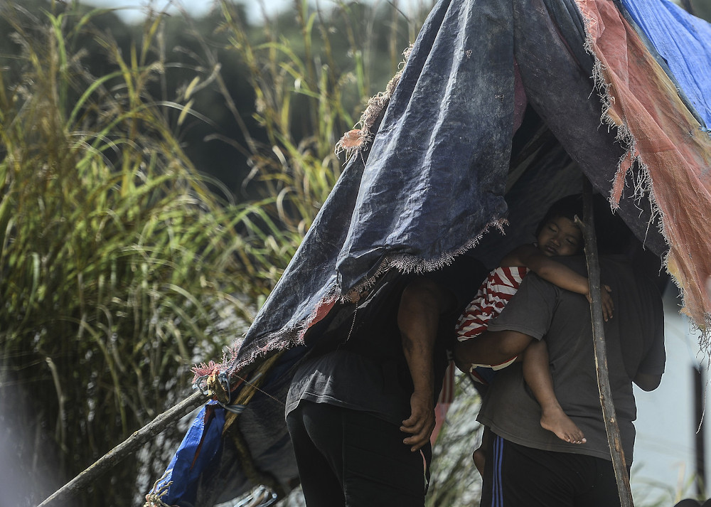 All 15 Seletar Orang Asli families from Kampung Orang Asli Simpang Arang in Iskandar Puteri who fled into a nearby mangrove forest on December 8 over fears of contracting Covid-19 have returned to their homes since December 13, 2020. u00e2u20acu201d Bernama pic 