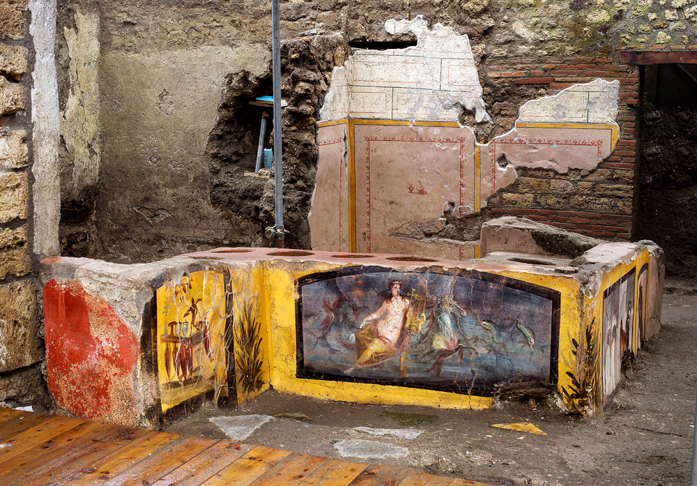 This picture released on December 26, 2020 by the Pompei Press Office shows a thermopolium, a sort of street u00e2u20acu02dcfast-foodu00e2u20acu2122 counter in ancient Rome decorated with polychrome motifs and in an exceptional state of preservation. u00e2u20acu201d AFP pic 