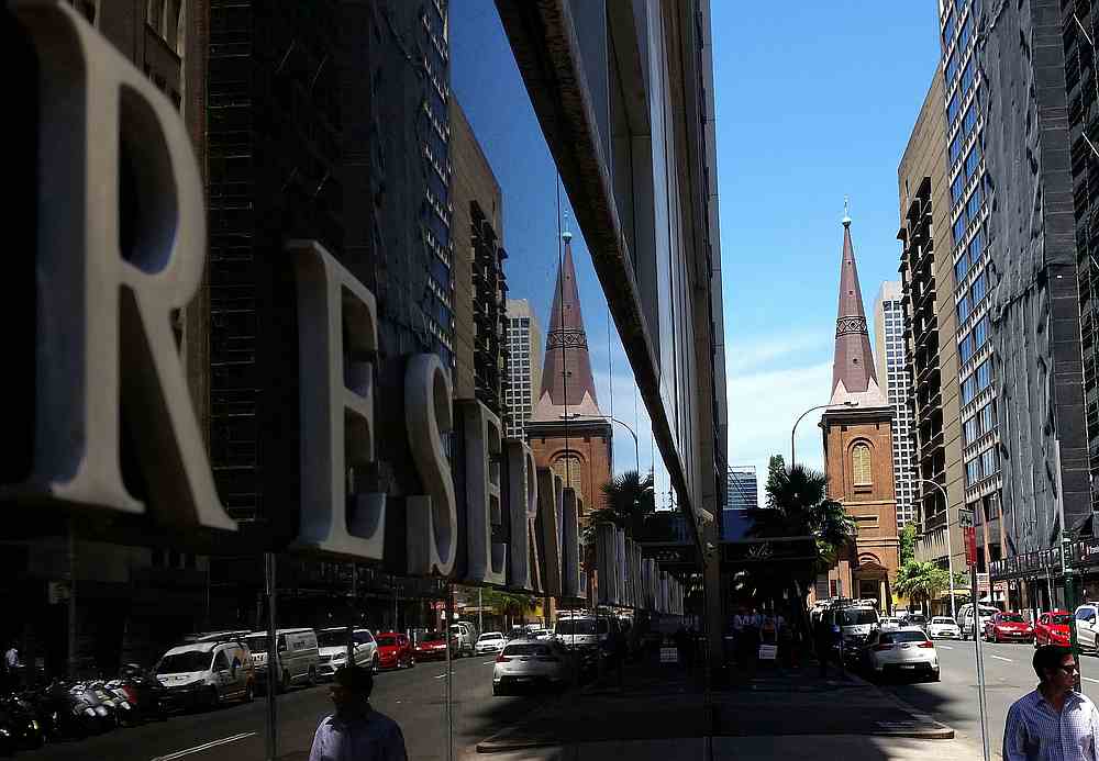 Pedestrians walk past the Reserve Bank of Australia building in central Sydney, Australia February 10, 2017. u00e2u20acu201d Reuters pic