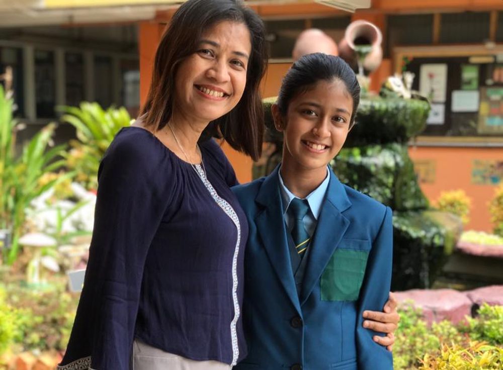 Dhaanniya Mary Andrew (right) and her coach Sharmila Ramachandran had 19 training sessions in total to prepare her for the competition. u00e2u20acu201d Picture courtesy of Sharmila Ramachandran