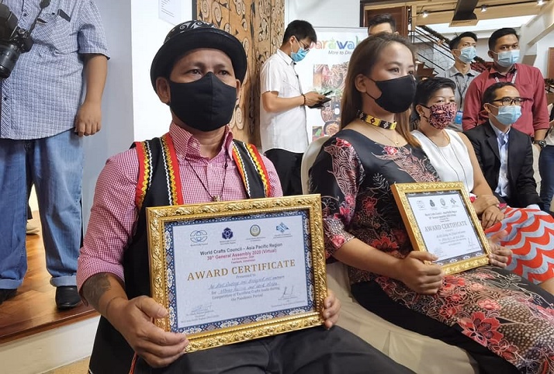 Sarawak artists Abot Gudang (left) and Sandra Trinata with their World Crafts Council Asia Pacific awards which they won in Tashkent,  Uzbekistan, December 18, 2020. u00e2u20acu2022 Picture courtesy of Sarawak Crafts Council
