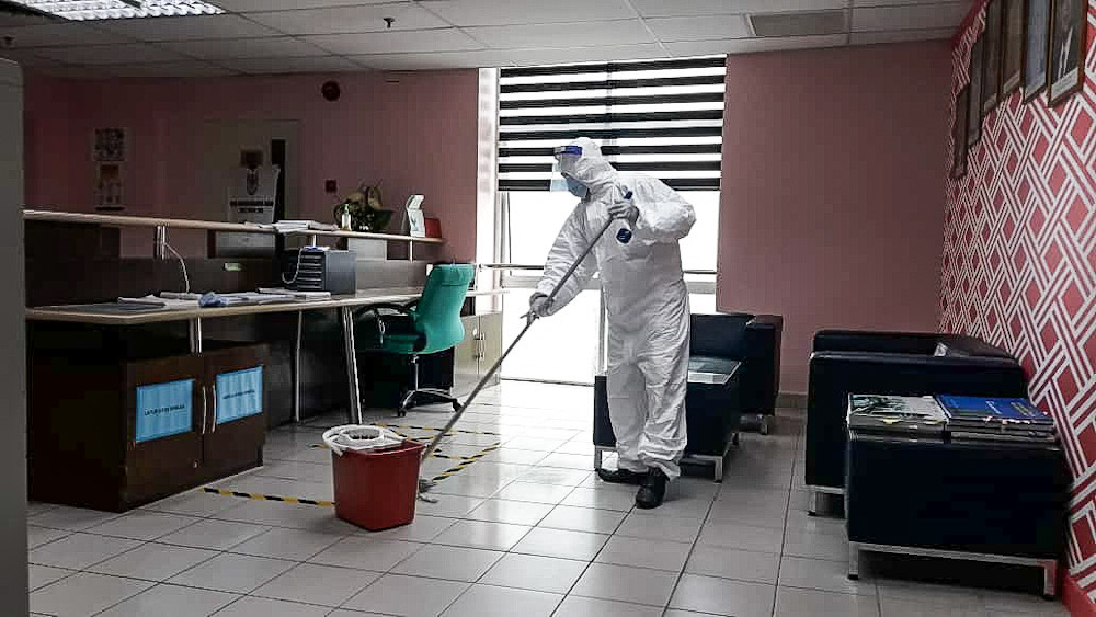 A worker sanitises the Seberang Perai Municipal Council building after one of its staff tested positive for Covid 19. u00e2u20acu201d Picture courtesy of MBSP