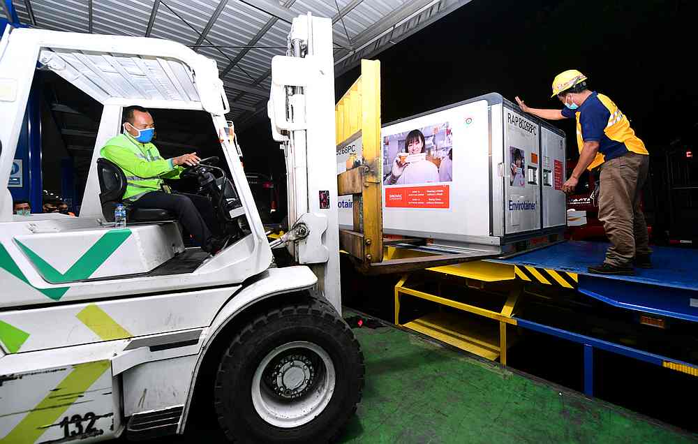 Container with Covid-19 vaccines from China's Sinovac Biotech Ltd in the first shipment to Indonesia at Soekarno Hatta International airport in Tangerang near Jakarta, December 7, 2020. u00e2u20acu201d Indonesian Presidential Palace handout via Reuters