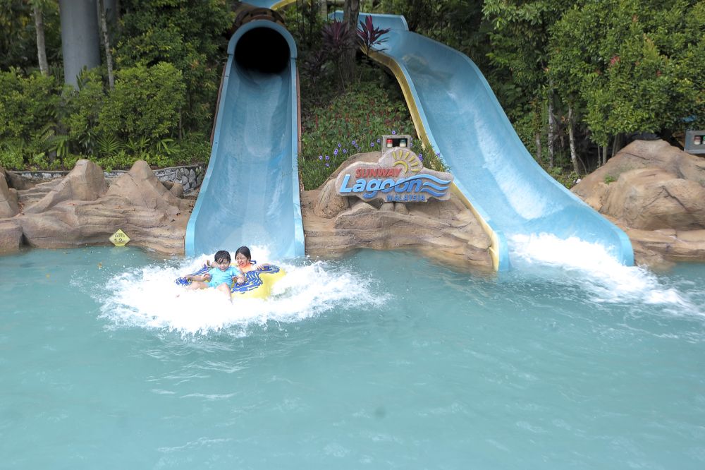 Sunway Lagoon welcomed visitors to its water theme park in Subang Jaya yesterday. — Picture by Shafwan Zaidon