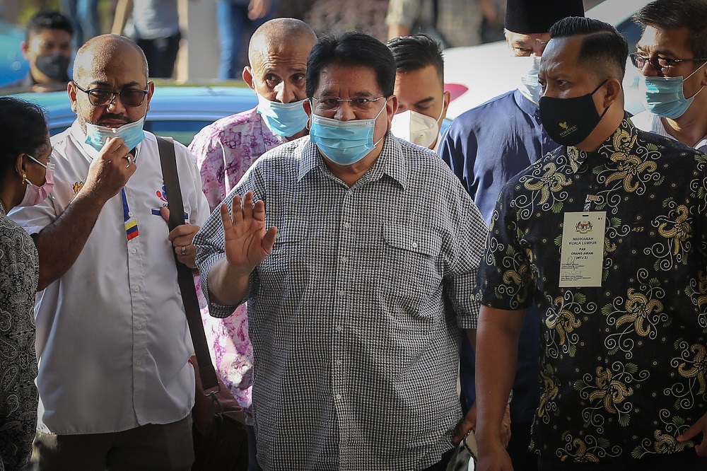 Former Federal Territories minister Datuk Seri Tengku Adnan Tengku Mansor arrives at the Kuala Lumpur Court Complex December 21, 2020. u00e2u20acu2022 Picture by Yusof Mat Isa