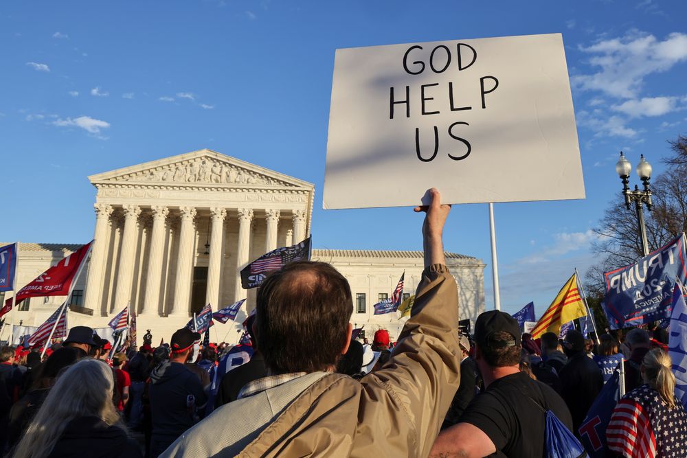 A person holds a sign during a rally to protest the results of the election, in front of the US Supreme Court, in Washington, US, December 12, 2020. u00e2u20acu201d Reuters pic