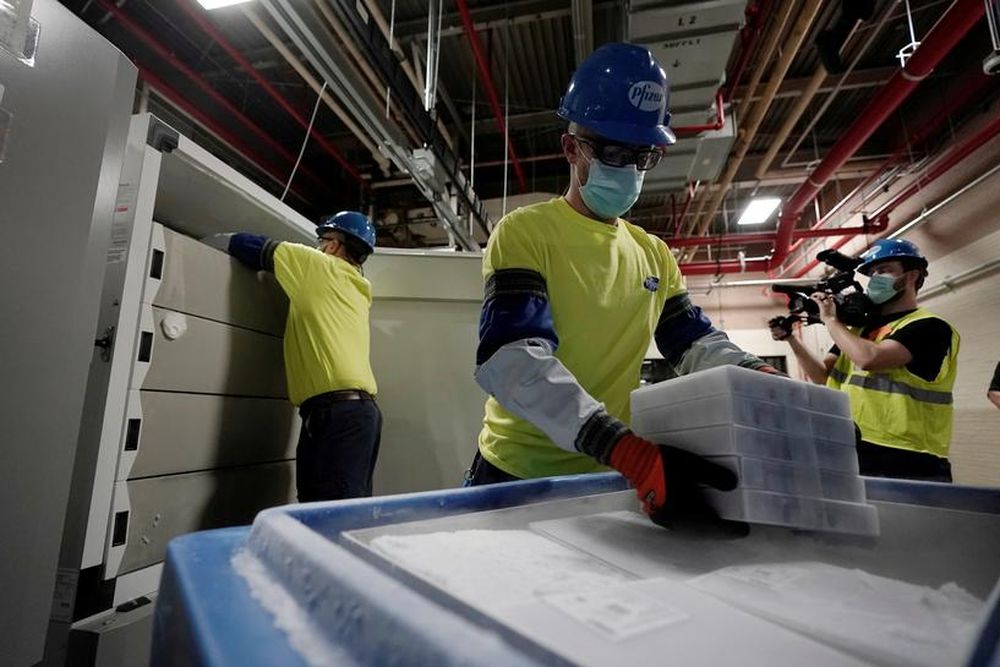 Boxes containing the Pfizer-BioNTech Covid-19 vaccine are prepared to be shipped at the Pfizer Global Supply Kalamazoo manufacturing plant in Portage, Michigan, US, December 13, 2020. u00e2u20acu201d Morry Gash/Pool pic via Reuters