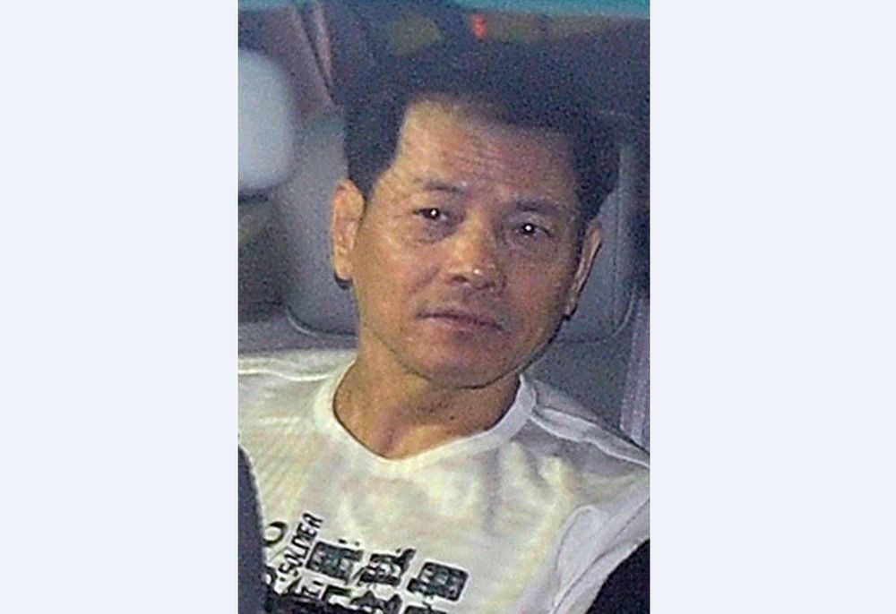 In this file photo taken on December 01, 2012, Wan Kuok-koi is driven away from the Macau prison. The US Treasury slapped sanctions on December 9, 2020 on the notorious Chinese organised crime leader known as u00e2u20acu02dcBroken Toothu00e2u20acu2122. u00e2u20acu201d AFP pic