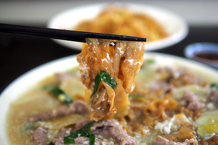 The flat rice noodles are beautifully charred with a slightly chewy texture