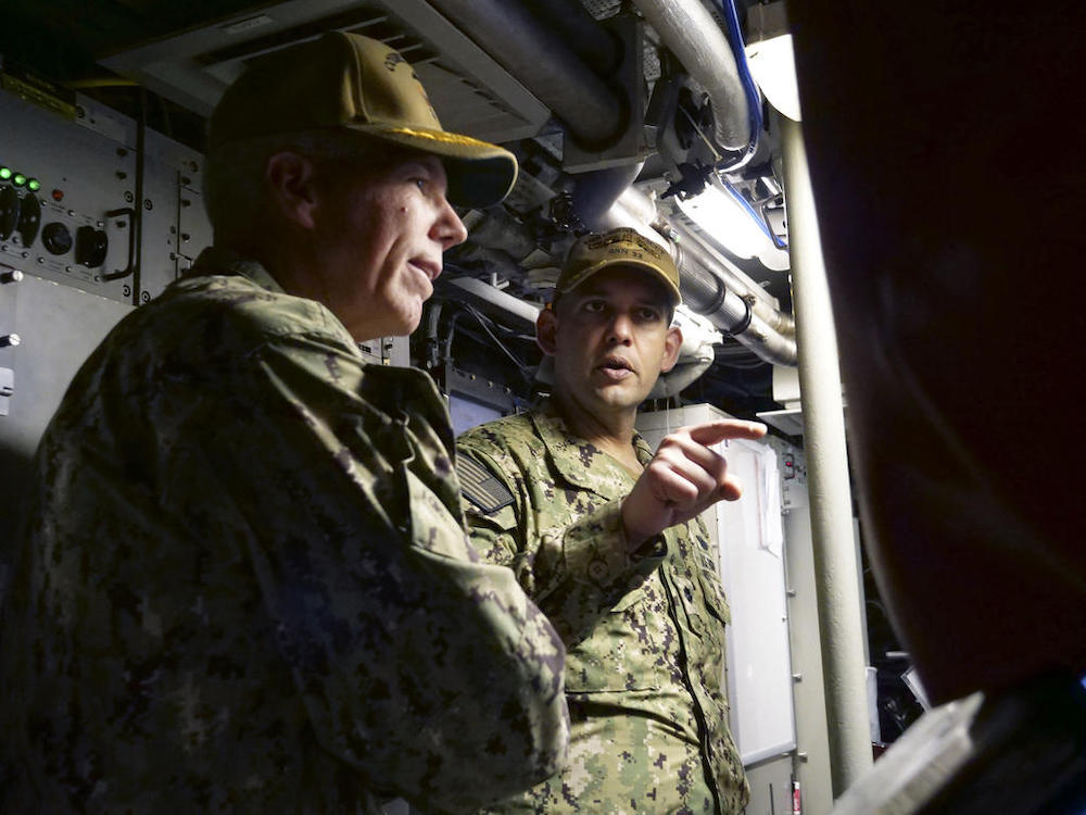 United States Navy Commander Cameron Aljilani (right) and two others were removed from their positions following an investigation into the crash in the disputed South China Sea. u00e2u20acu201d AFP/US Navy pic