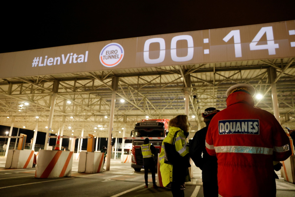 The first trucks leave Eurotunnel's new customs border in Calais just after midnight, as Britain formally exits the European Union, France January 1, 2021. u00e2u20acu201d Reuters pic