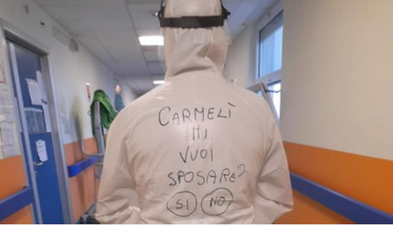 Giuseppe Pungente's Facebook post has gone viral after he proposed to his girlfriend with the big question scrawled on the back of his head-to-toe protective clothing. u00e2u20acu201d Picture courtesy of Facebook/Giuseppe Pungente