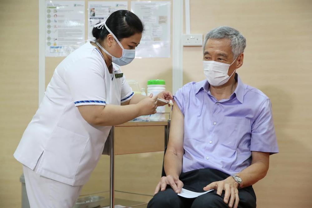 Prime Minister Lee Hsien Loong receives his first Covid-19 jab at the Singapore General Hospital January 8, 2021. u00e2u20acu201d Picture courtesy of Ministry of Communications and Information