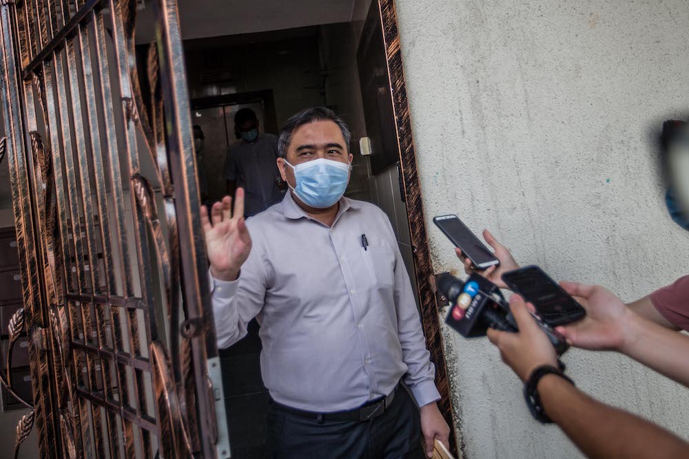 DAP organising secretary Anthony Loke leaves PKRu00e2u20acu2122s headquarters after meeting with Pakatan Harapan presidential council in Petaling Jaya January 12, 2021. u00e2u20acu201d Picture by Firdaus Latif