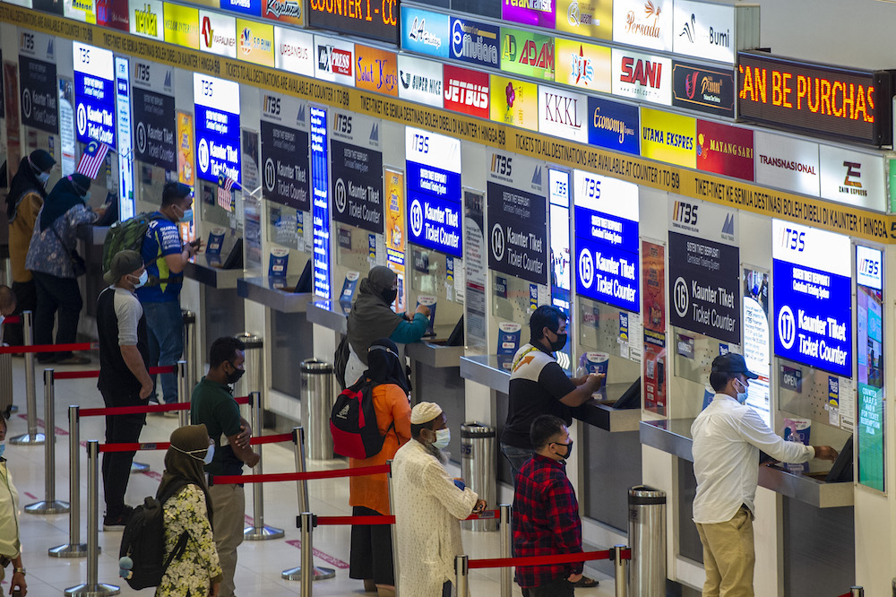 Members of the public are seen at Terminal Bersepadu Selatan in Kuala Lumpur after the government announced the reimplementation of the movement control order, January 12, 2021. u00e2u20acu201d Picture by Shafwan Zaidon