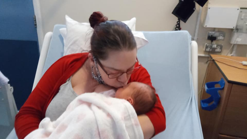 Samantha Hicks cradling baby Julia at the hospital. u00e2u20acu201d Photo via Facebook/ Joe Bangles Hicks