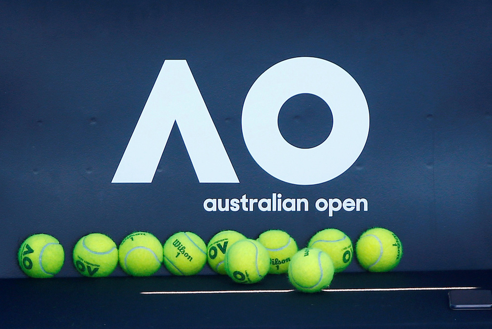Tennis balls are pictured in front of the Australian Open logo before the tennis tournament. u00e2u20acu201d Reuters pic