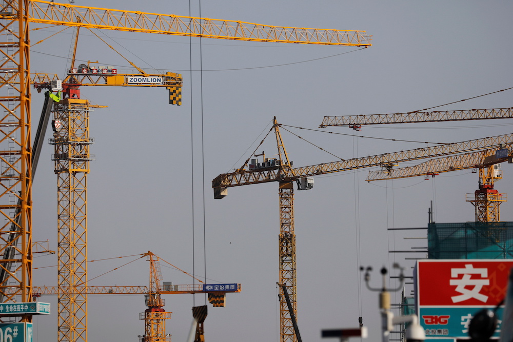 Cranes are seen at a construction site in Beijing, China January 13, 2021. u00e2u20acu201d Reuters pic