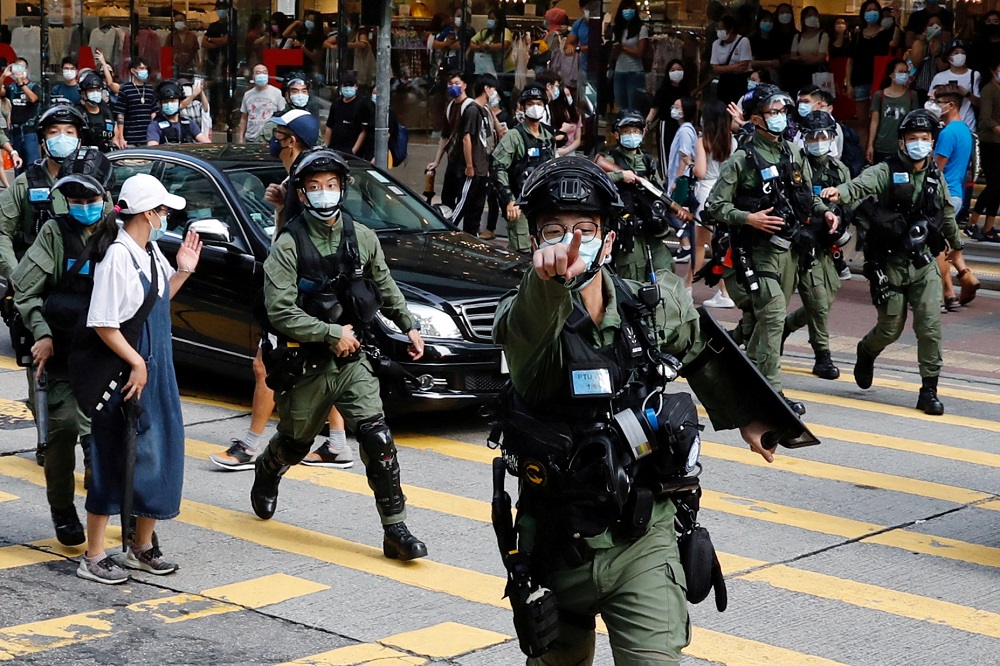 Riot police chase pro-democracy protesters during a demonstration opposing postponed elections, in Hong Kong September 6, 2020. u00e2u20acu201d Reuters pic
