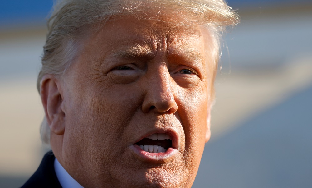US President Donald Trump yells as he visits the US-Mexico border wall, in Alamo, Texas January 12, 2021. u00e2u20acu201d Reuters pic