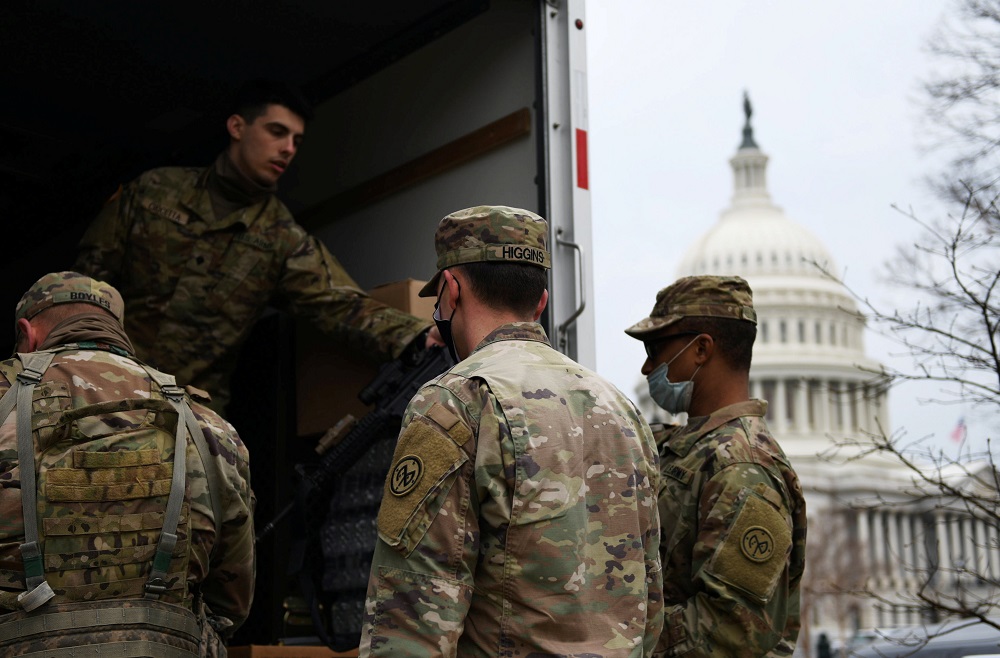 Officers from the National Guard check in their weapons at the Capitol Building in Washington DC, days ahead of US President-elect Joe Biden's inauguration, January 15, 2021. u00e2u20acu201d Reuters pic
