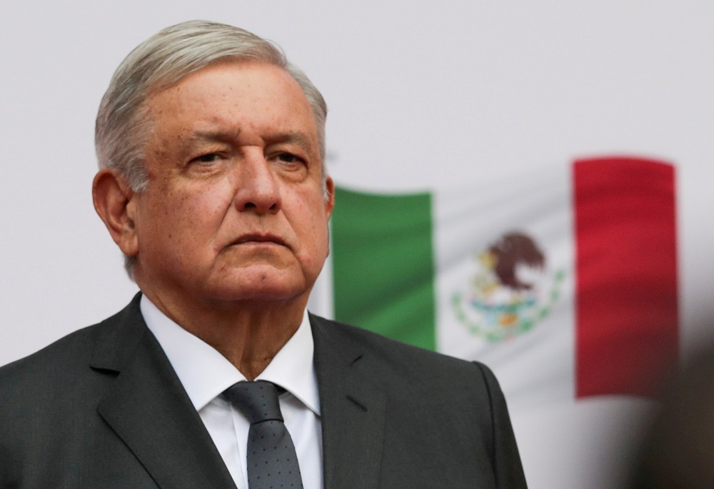 Mexicou00e2u20acu2122s President Andres Manuel Lopez Obrador listens to the national anthem as he arrives to address the nation on his second anniversary as President of Mexico, at the National Palace in Mexico City December 1, 2020. u00e2u20acu201d Reuters pic