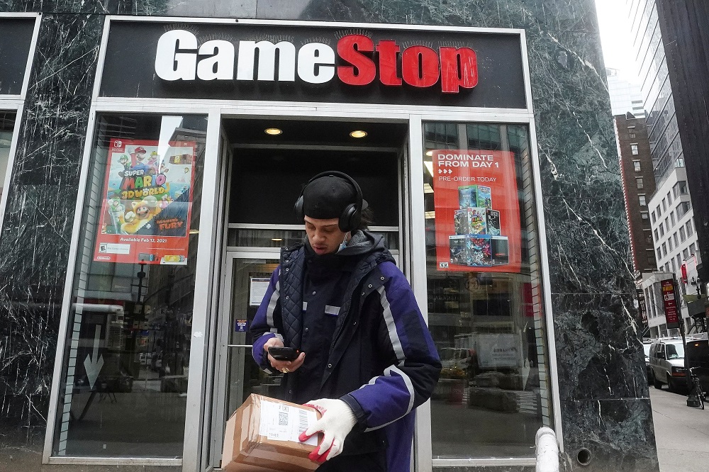 A Fedex deliveryman prepares a package for a GameStop store amid the coronavirus disease pandemic in the Manhattan borough of New York January 27, 2021. u00e2u20acu201d Reuters pic