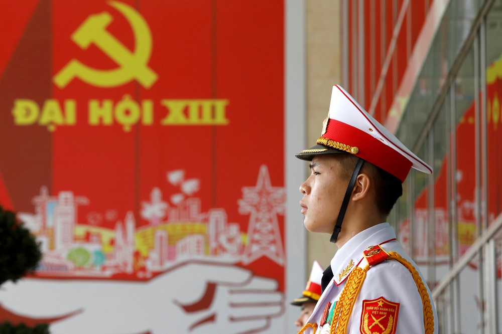 A Vietnamese soldier stands guard at the National Convention Centre, the venue for the 13th national congress of the Communist Party of Vietnam, in Hanoi January 27, 2021. u00e2u20acu201d Reuters