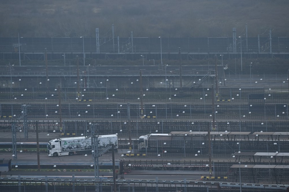 Lorries disembark a freight train at the Eurotunnel terminal at Folkestone, Southeast England, on December 31, 2020. u00e2u20acu201d AFP pic