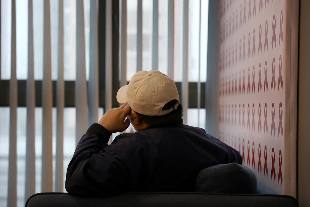 A back view of a 50-year-old heterosexual Singaporean who has HIV. The Covid-19 crisis has wiped out his business and affected his medical treatments. u00e2u20acu201d TODAY pic