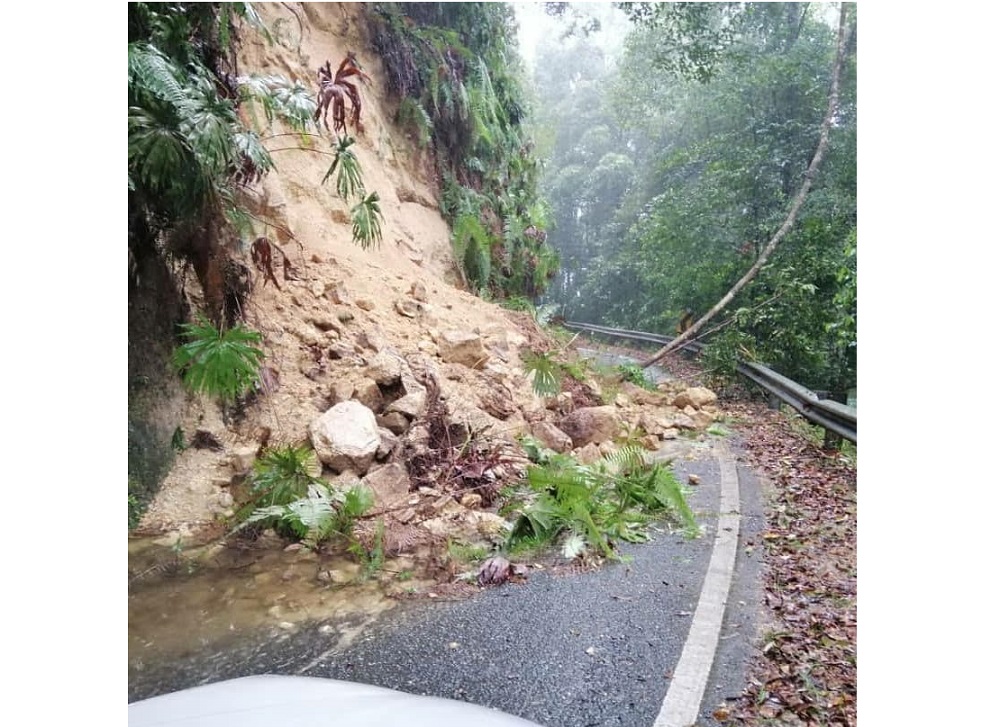One of the roads to Fraseru00e2u20acu2122s Hill has been cut off by the landslides caused by heavy rainfall in Pahang yesterday. u00e2u20acu201d Picture by Lukman Hakim Hogg