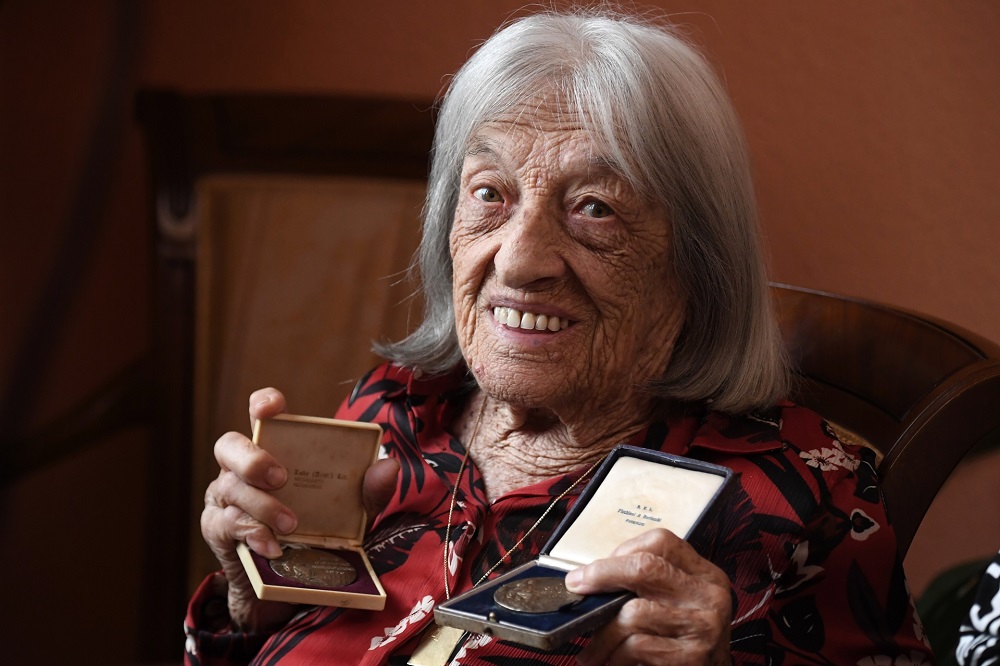 Hungarian-Israeli retired Olympic and world champion artistic gymnast Agnes Keleti shows her first gold medal (right) won during the Olympic Games in Helsinki and her second one (left) won in Melbourne. u00e2u20acu201d AFP pic