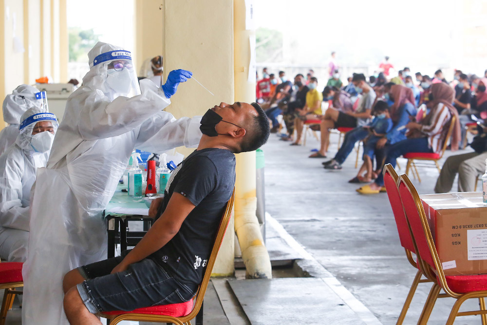 Health officers conduct the Covid-19 antigen rapid test at Laurent Bleu, CMC Centre Cheras January 11, 2021. u00e2u20acu201d Picture by Choo Choy May
