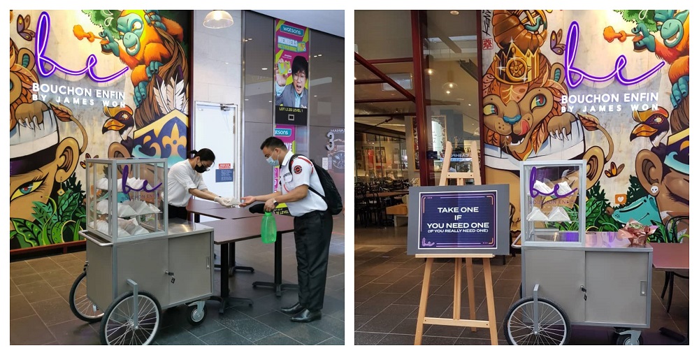 People receiving free sandwiches made specially by the workers of Bouchon Enfin by James Won in Pavilion Kuala Lumpur. u00e2u20acu201d Picture courtesy of James Won.