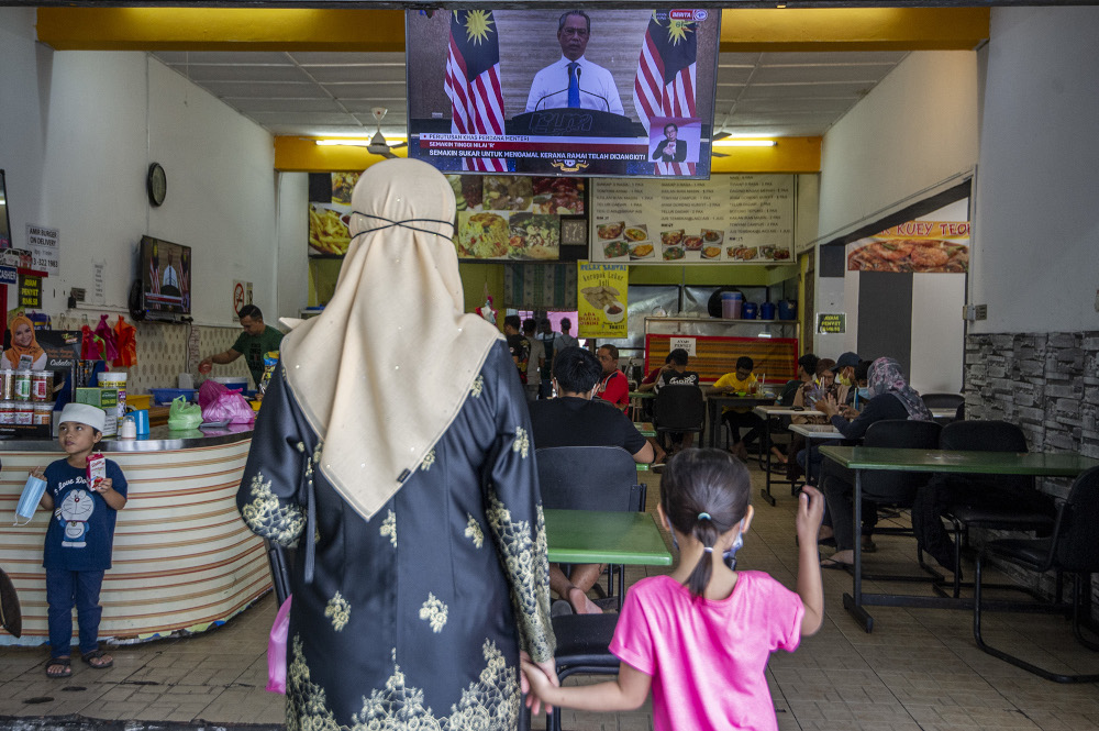 The live telecast of Prime Minister Tan Sri Muhyiddin Yassin speech about the movement control order in Kajang January 11, 2020. u00e2u20acu201d Picture by Shafwan Zaidon