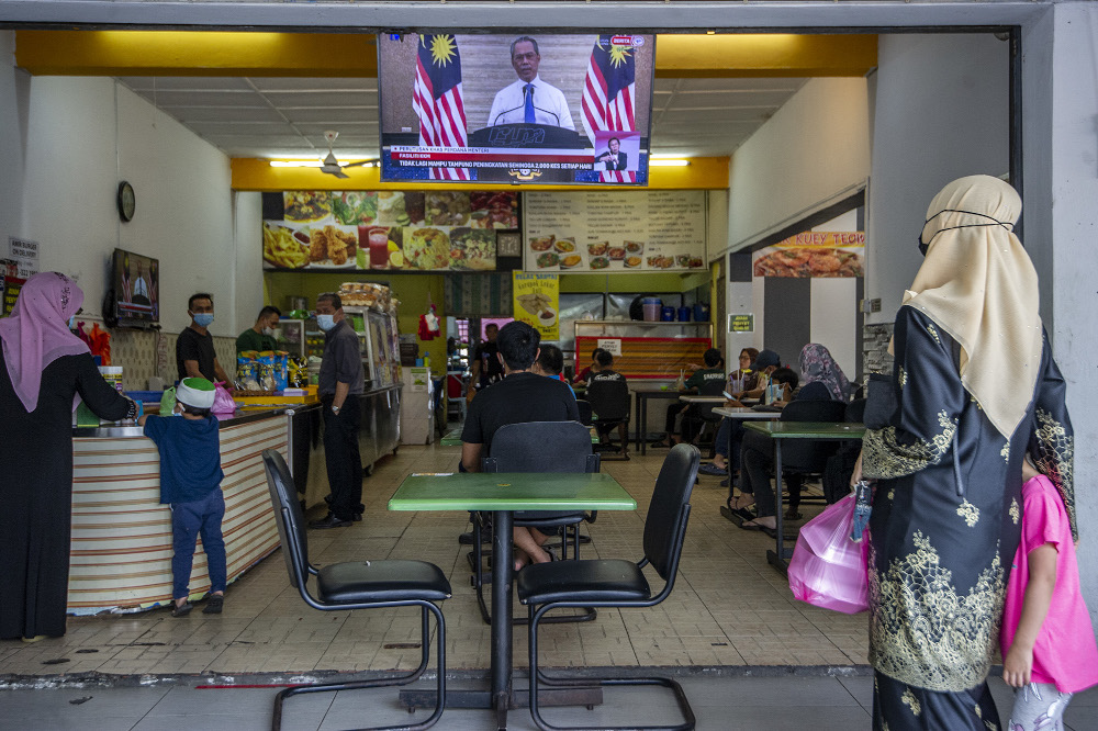 The live telecast of Prime Minister Tan Sri Muhyiddin Yassin speech about the movement control order in Kajang January 11, 2020. u00e2u20acu201d Picture by Shafwan Zaidon