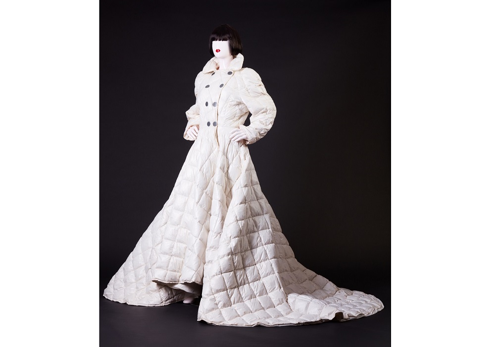 Quilted ivory u00e2u20acu02dcparkau00e2u20acu2122 dress with double buttoning and long train u00e2u20acu201d a one-off design for the final of the run the design by Chantal Thomass x Moncler. u00e2u20acu201d Picture courtesy of Chantal Thomass / Photo Jo Zhou